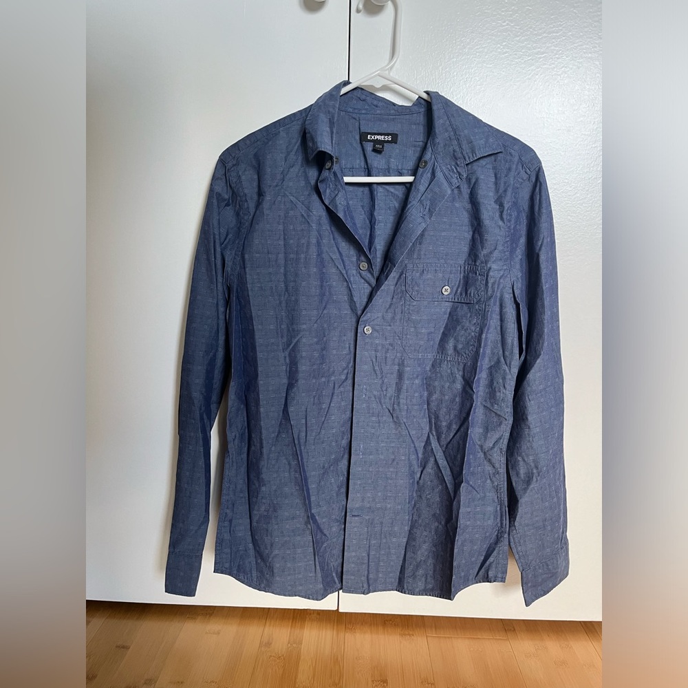 Men’s long sleeve collared shirt. Worn gently. Smoke/pet free home. Color blue